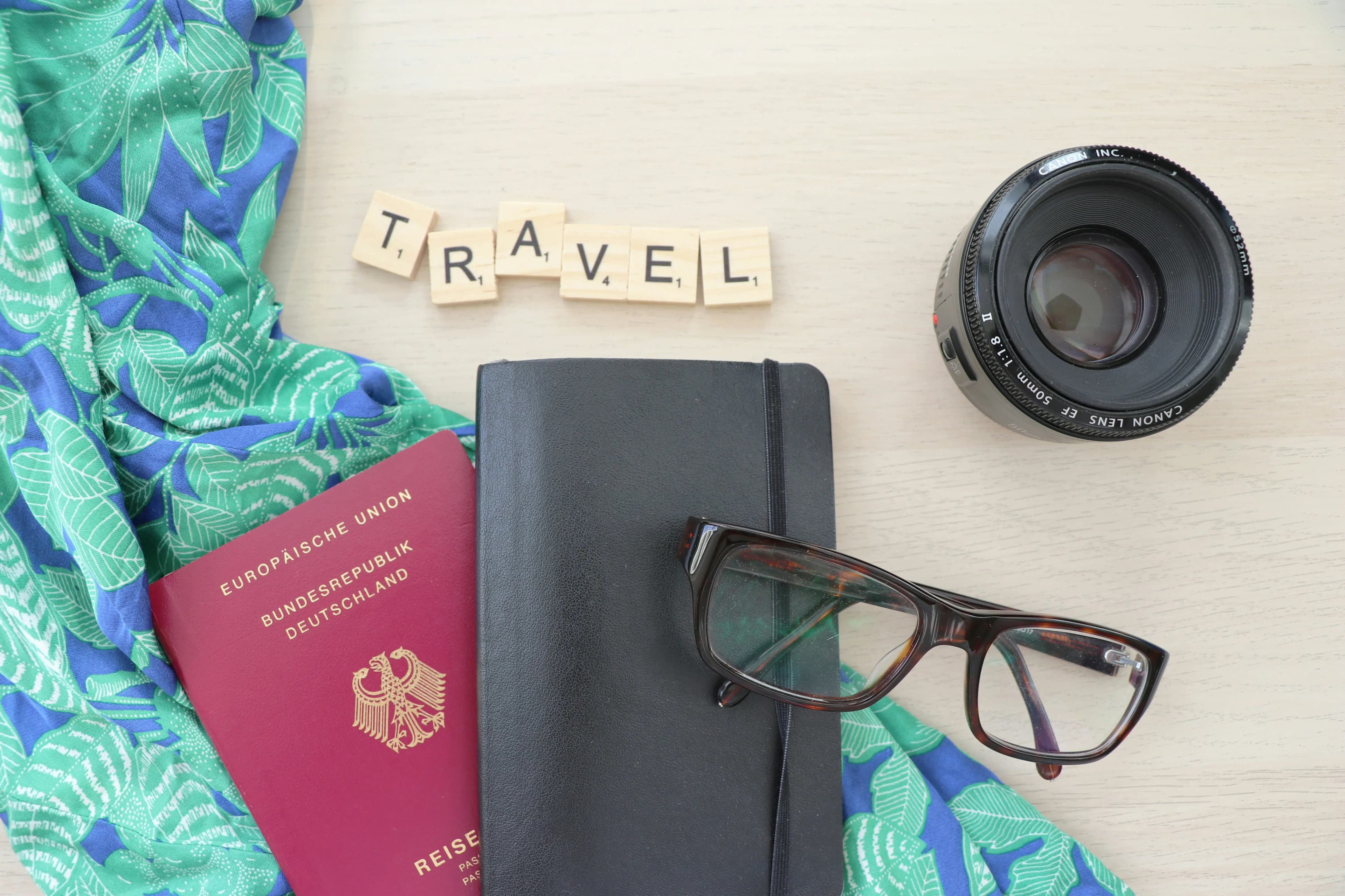 An hourglass with sand running out, set against a backdrop of a travel map and airplane, symbolizing expiring travel offers.