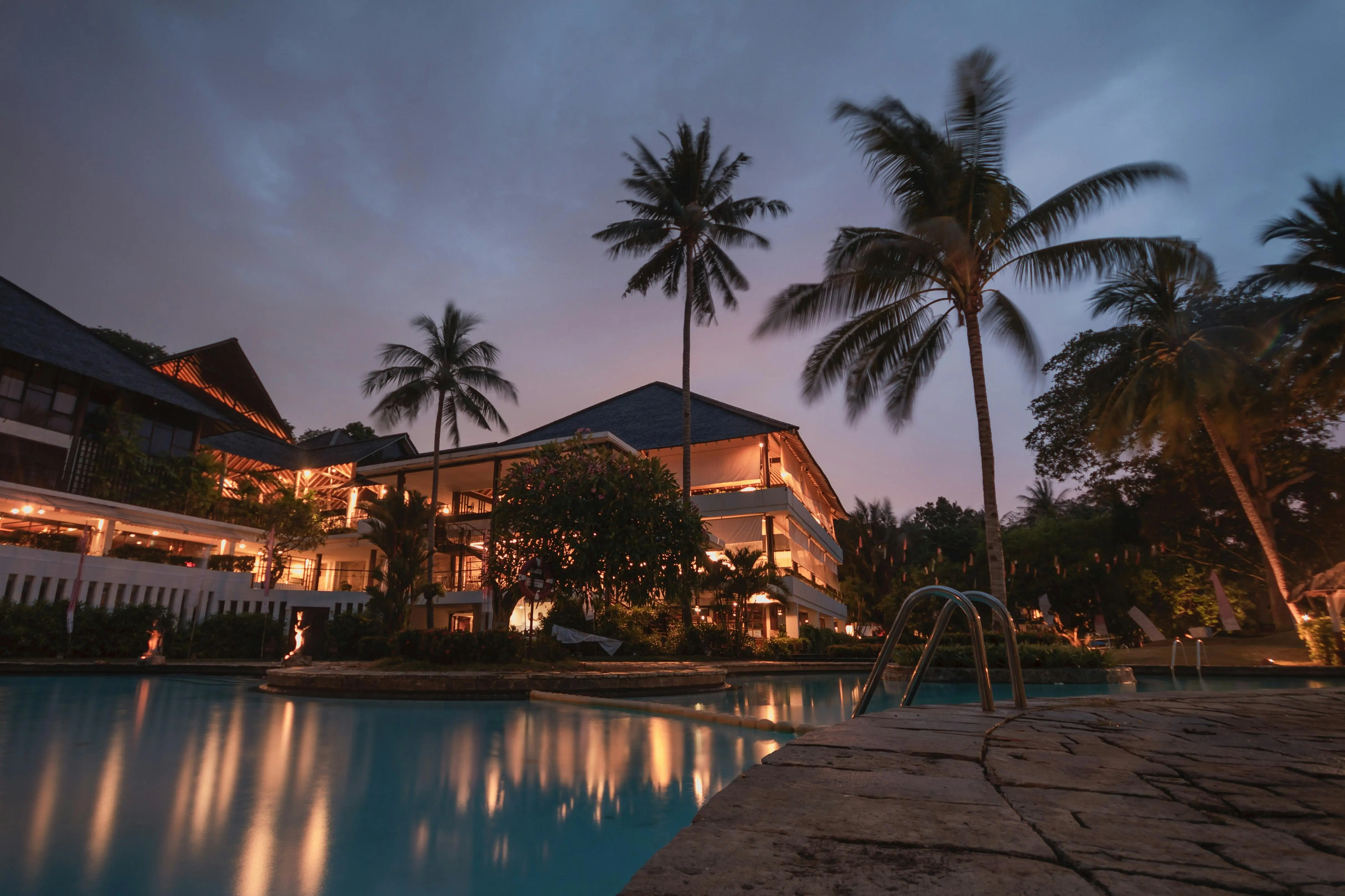 IHG One Rewards Premier Credit Card with a summer vacation backdrop