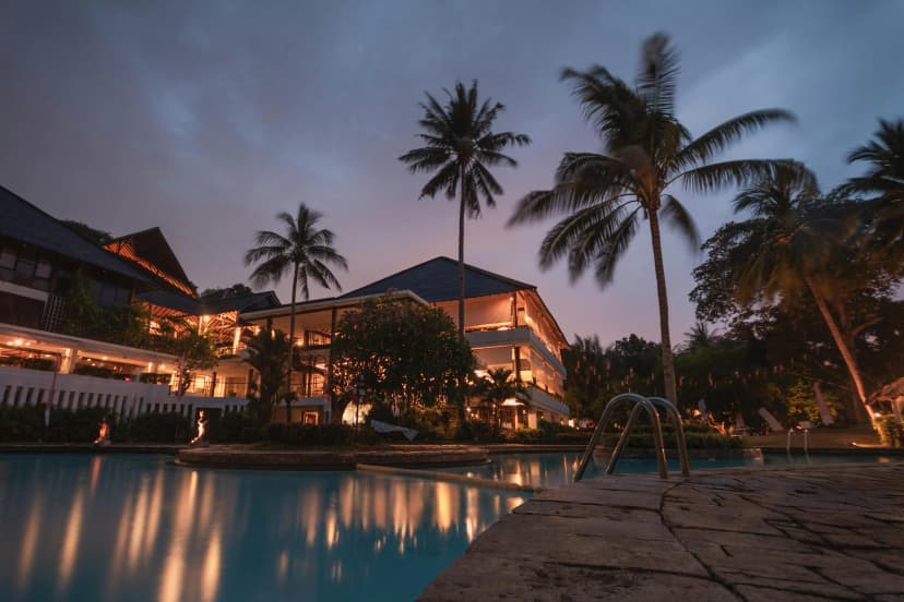 IHG One Rewards Premier Credit Card with a summer vacation backdrop